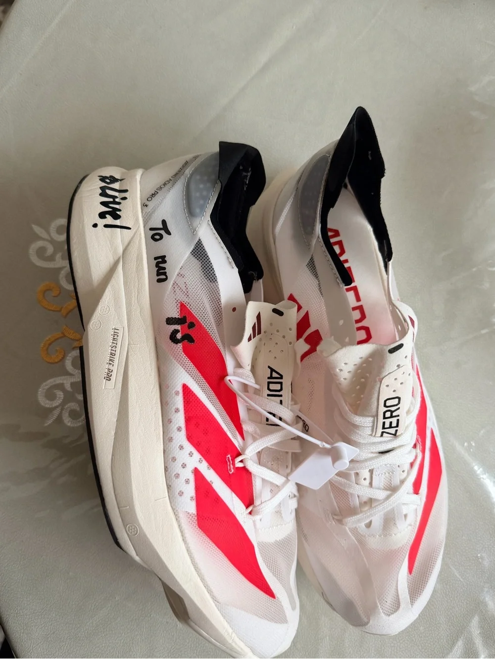 adidas White & Red Running Sneakers - Signature Stripe Design